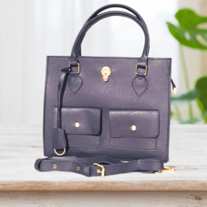 "Dark blue handbag with dual front pockets, gold-tone hardware, and detachable shoulder strap – Stylish ladies’ purse for everyday use"